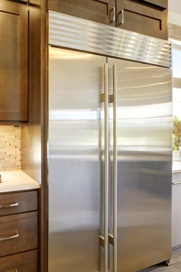 Refrigerator repair service in a Naples kitchen
